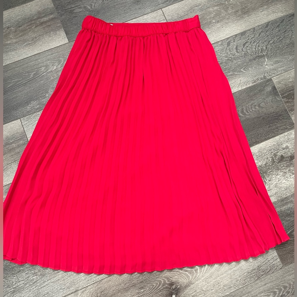 Red pleated skirt
